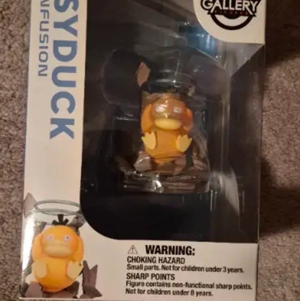 Pokemon Psyduck Figure with Orange and Yellow Details